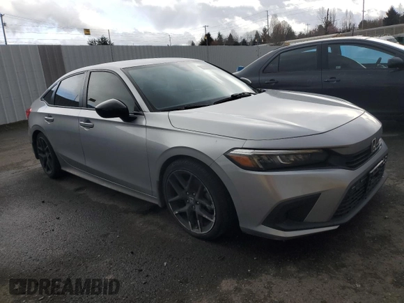 2022 Honda Civic Sport with VIN 2HGFE2F52NH530551, listed as a Copart auction lot 46464455 with 71,564 mi miles and Salvage Title. Bid and sale history available at carsss.com. Image 4.
