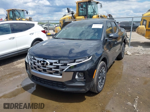 2022 Hyundai Santa Cruz SEL with VIN 5NTJBDAE2NH008015, listed as a IAAI auction lot 42232891 with 31,450 mi miles and . Bid and sale history available at DreamBid. Image 2.