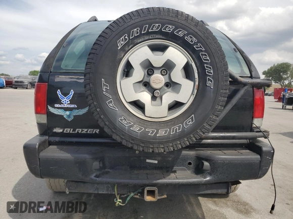 1999 Chevrolet Blazer LS with VIN 1GNCT18W6XK224253, listed as a Copart auction lot 50708405 with 209,711 mi miles and Salvage title. Bid and sale history available at DreamBid. Image 6.