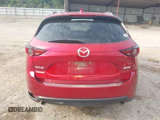 2017 Mazda CX-5 Grand Touring with VIN JM3KFADL8H0189033, listed as a IAAI auction lot 40029931 with 88,933 mi miles and . Bid and sale history available at carsss.com. Image 17.