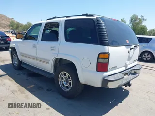 2004 Chevrolet Tahoe LS with VIN 1GNEC13T64R292075, listed as a IAAI auction lot 42138343 with 236,054 mi miles. Bid and sale history available at carsss.com. Image 3.