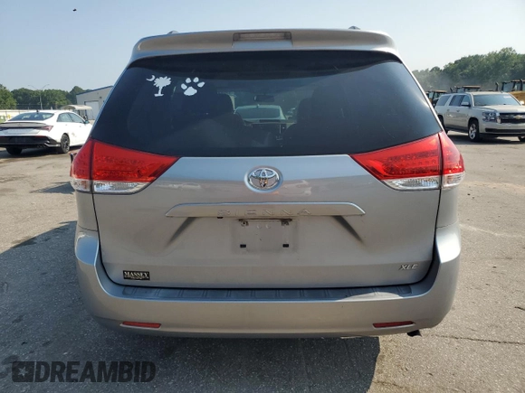 2013 Toyota Sienna XLE AAS with VIN 5TDYK3DC0DS357281, listed as a Copart auction lot 61640645 with 69,262 mi miles and Salvage title. Bid and sale history available at DreamBid. Image 6.