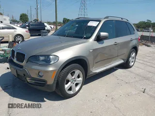 2008 BMW X5 3.0si with VIN 5UXFE43568L024029, listed as a IAAI auction lot 42107247 with 135,607 mi miles. Bid and sale history available at carsss.com. Image 2.
