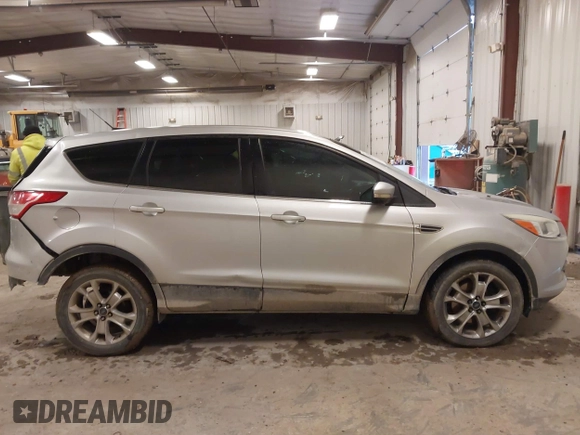 2013 Ford Escape SEL with VIN 1FMCU0H98DUC72150, listed as a IAAI auction lot 41213748 with 136,323 mi miles. Bid and sale history available at carsss.com. Image 12.