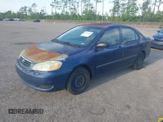 2005 Toyota Corolla CE with VIN 1NXBR32E25Z563569, listed as a IAAI auction lot 42100384 with 243,610 mi miles and . Bid and sale history available at DreamBid. Image 2.