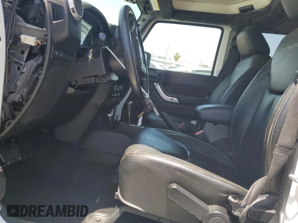 2015 Jeep Wrangler Unlimited Rubicon с VIN 1C4BJWFG3FL771508, выставлен на аукционе Copart как лот 62006295 с пробегом 108 128 миль миль и Списание • Salvage title. История ставок и продаж доступна на DreamBid. Изображение 7.