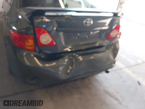 2010 Toyota Corolla with VIN 1NXBU4EE2AZ199308, listed as a IAAI auction lot 42105682 with 206,800 mi miles and . Bid and sale history available at DreamBid. Image 6.
