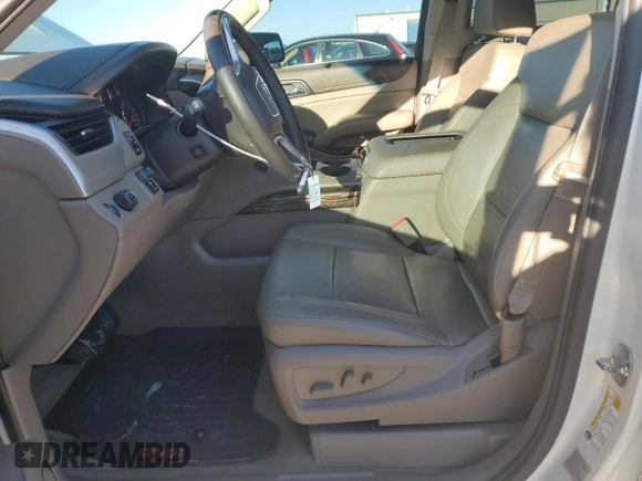 2015 GMC Yukon XL SLT with VIN 1GKS1HKC6FR166415, listed as a Copart auction lot 73029014 with 105,209 mi miles and Salvage Title. Bid and sale history available at carsss.com. Image 7.