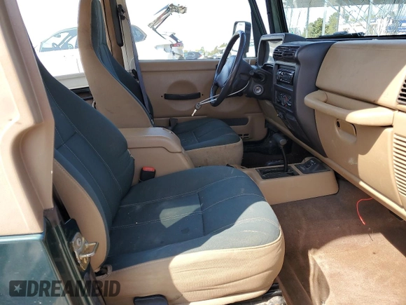 2001 Jeep Wrangler Sahara with VIN 1J4FA59S51P300953, listed as a Copart auction lot 51452505 with 157,642 mi miles and Clean Title. Bid and sale history available at carsss.com. Image 7.