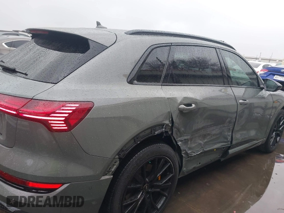 2023 Audi e-tron Chronos with VIN WA1VABGE2PB013244, listed as a IAAI auction lot 41283553 with 28,463 mi miles and . Bid and sale history available at DreamBid. Image 6.