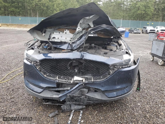 2021 Mazda CX-5 Grand Touring Reserve with VIN JM3KFBAY3M0327707, listed as a Copart auction lot 49733255 with 34,084 mi miles and Salvage Title. Bid and sale history available at carsss.com. Image 5.