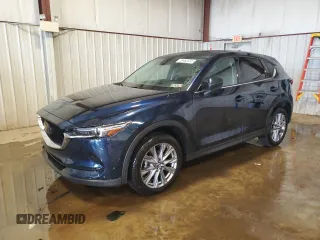 2020 Mazda CX-5 Grand Touring with VIN JM3KFBDM1L0860873, listed as a Copart auction lot 55463335 with 85,810 mi miles and Salvage Title. Bid and sale history available at DreamBid. Image 1.