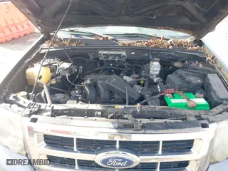 2008 Ford Escape XLT with VIN 1FMCU03178KA47527, listed as a IAAI auction lot 41672719 with 306,312 mi miles. Bid and sale history available at carsss.com. Image 10.