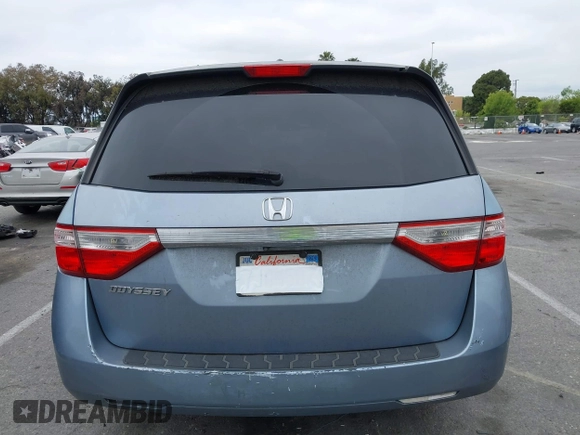 2012 Honda Odyssey EX-L with VIN 5FNRL5H66CB061847, listed as a IAAI auction lot 42162377 with 217,204 mi miles and . Bid and sale history available at DreamBid. Image 16.