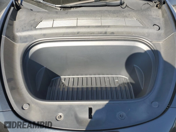 2022 Tesla Model Y Performance with VIN 7SAYGDEF1NF486218, listed as a Copart auction lot 63127435 with 99,302 mi miles and Salvage title. Bid and sale history available at DreamBid. Image 11.