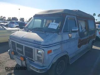 1989 GMC Vandura z VIN 1GDEG25K1K7521984, wystawiony jako IAAI lot #41371811 z przebiegiem 43 502 mil mil oraz . Historia ofert i sprzedaży dostępna na DreamBid. Obrazek 6.