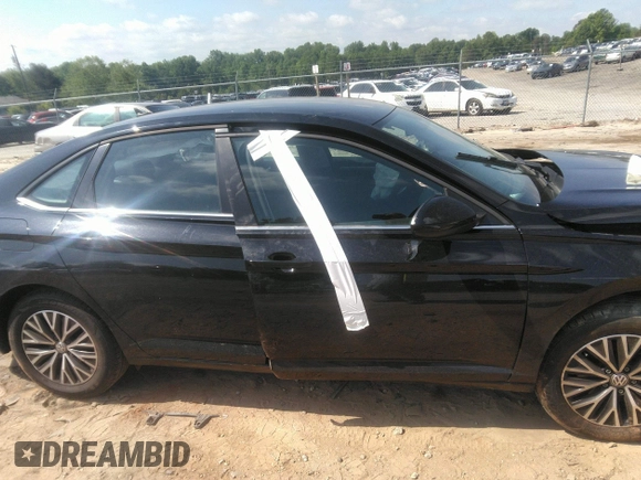 2021 Volkswagen Jetta S z VIN 3VWC57BU1MM038232, wystawiony jako IAAI lot #42196294 z przebiegiem 54 880 mil mil oraz . Historia ofert i sprzedaży dostępna na DreamBid. Obrazek 13.