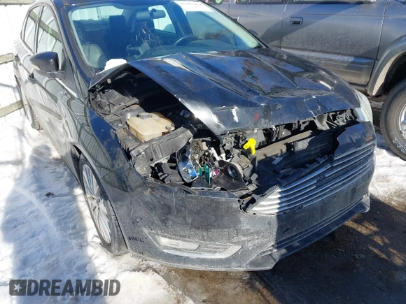 2015 Ford Focus Titanium with VIN 1FADP3J22FL323185, listed as a IAAI auction lot 41461154 with 125,477 mi miles and . Bid and sale history available at carsss.com. Image 6.