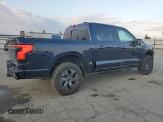 2023 Ford F-150 Lightning Pro with VIN 1FTVW1EV1PWG16263, listed as a Copart auction lot 54439535 with 12,023 mi miles and Salvage Title. Bid and sale history available at DreamBid. Image 3.