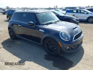 2013 MINI Hardtop S with VIN WMWSV3C51DT395858, listed as a IAAI auction lot 42055854 with 119,416 mi miles and . Bid and sale history available at DreamBid. Image 1.
