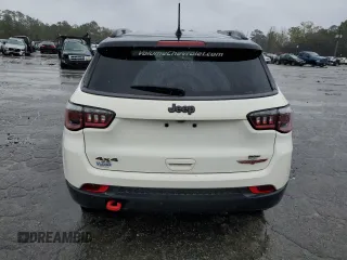 2019 Jeep Compass Trailhawk with VIN 3C4NJDDB0KT671213, listed as a Copart auction lot 49506685 with 77,985 mi miles and Salvage Title. Bid and sale history available at carsss.com. Image 6.