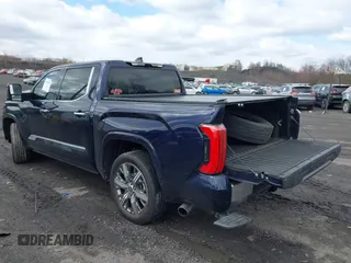 2022 Toyota Tundra Capstone Hybrid with VIN 5TFVC5DB5NX009829, listed as a IAAI auction lot 41983391 with 70,015 mi miles and . Bid and sale history available at DreamBid. Image 3.