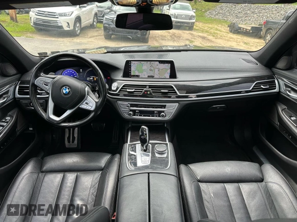 2019 BMW 7 Series 740i xDrive with VIN WBA7E4C55KGV28722, listed as a Copart auction lot 64955445 with 94,901 mi miles and Clean title. Bid and sale history available at DreamBid. Image 6.