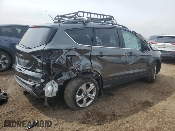 2016 Ford Escape SE z VIN 1FMCU9GX0GUC25252, wystawiony jako Copart lot #51181165 z przebiegiem 76 653 mil mil oraz Szkody całkowita. Historia ofert i sprzedaży dostępna na DreamBid. Obrazek 3.