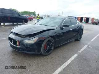 2014 Maserati Ghibli z VIN ZAM57XSA7E1091443, wystawiony jako IAAI lot #42163436 z przebiegiem 76 762 mil mil oraz . Historia ofert i sprzedaży dostępna na DreamBid. Obrazek 2.