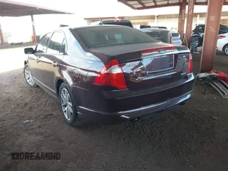 2011 Ford Fusion SEL with VIN 3FAHP0JG7BR324789, listed as a IAAI auction lot 42039962 with 164,726 mi miles. Bid and sale history available at carsss.com. Image 3.