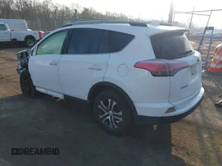2017 Toyota RAV4 LE with VIN JTMZFREV7HJ120317, listed as a IAAI auction lot 41166489 with 144,799 mi miles and . Bid and sale history available at carsss.com. Image 3.