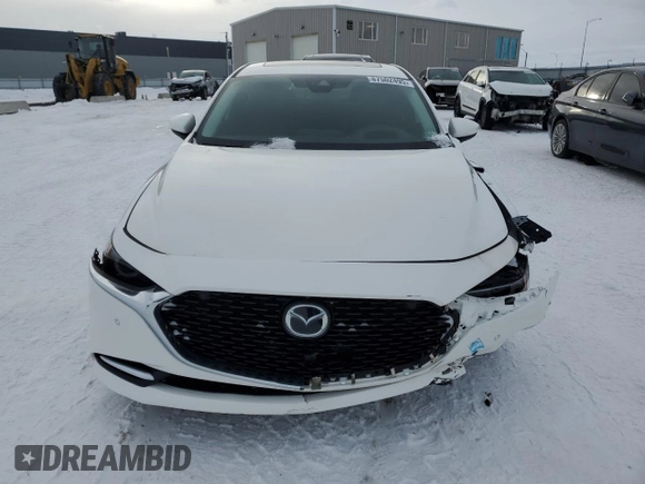 2021 Mazda 3 2.5 Turbo with VIN JM1BPBAY5M1308950, listed as a Copart auction lot 87502495 with 62,843 mi miles and Salvage Title. Bid and sale history available at DreamBid. Image 5.