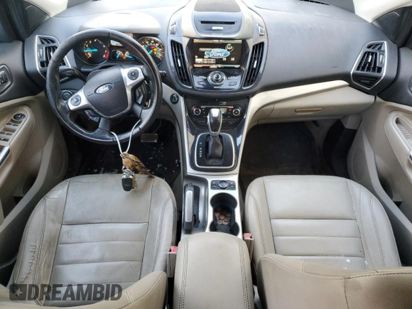 2013 Ford Escape SEL z VIN 1FMCU9H96DUD30275, wystawiony jako Copart lot #88585435 z przebiegiem 317 668 mil mil oraz Czysty tytuł • Clean title. Historia ofert i sprzedaży dostępna na DreamBid. Obrazek 8.