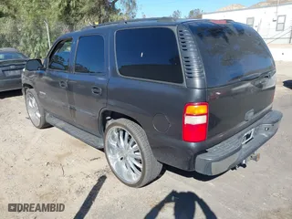 2003 Chevrolet Tahoe LT with VIN 1GNEC13T23R289916, listed as a IAAI auction lot 41408918 with 95,711 mi miles. Bid and sale history available at carsss.com. Image 3.