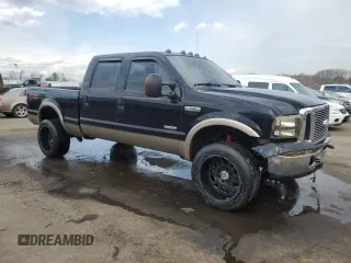 2005 Ford F-350 XL with VIN 1FTWW31P05EC09657, listed as a Copart auction lot 51969665 with 158,206 mi miles and Salvage Title. Bid and sale history available at DreamBid. Image 4.