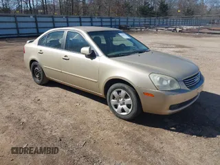 2008 Kia Optima LX z VIN KNAGE123985270711, wystawiony jako IAAI lot #41659584 z przebiegiem 187 964 mil mil oraz . Historia ofert i sprzedaży dostępna na DreamBid. Obrazek 1.