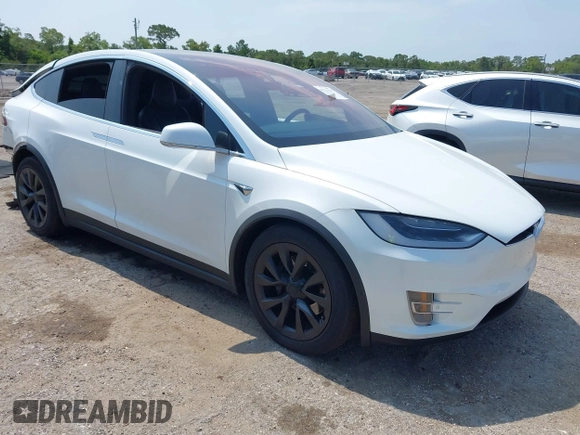 2016 Tesla Model X 70D z VIN 5YJXCBE25GF029372, wystawiony jako IAAI lot #42325335 z przebiegiem 80 071 mil mil oraz . Historia ofert i sprzedaży dostępna na DreamBid. Obrazek 1.