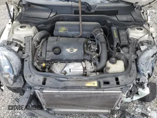 2012 MINI Coupe S z VIN WMWSX3C56CT154872, wystawiony jako Copart lot #68011264 z przebiegiem 91 650 mil mil oraz Szkody całkowita. Historia ofert i sprzedaży dostępna na DreamBid. Obrazek 13.