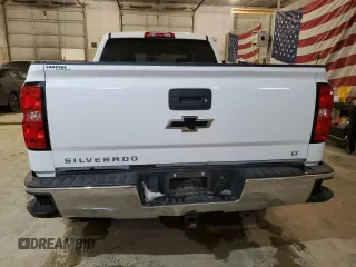 2018 Chevrolet Silverado 1500 LT with VIN 1GCUKREC8JF200108, listed as a Copart auction lot 44582405 with 126,169 mi miles and Salvage Title. Bid and sale history available at DreamBid. Image 6.