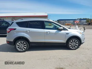 2017 Ford Escape Titanium with VIN 1FMCU9JD3HUE03686, listed as a IAAI auction lot 42016950 with 82,299 mi miles. Bid and sale history available at carsss.com. Image 13.