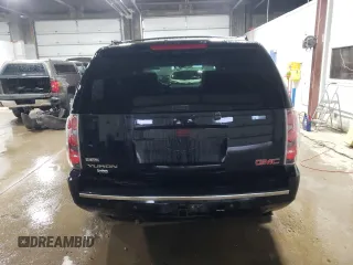 2009 GMC Yukon Denali z VIN 1GKFK03279R282409, wystawiony jako Copart lot #51534755 z przebiegiem 197 150 mil mil oraz Tytuł czysty. Historia ofert i sprzedaży dostępna na DreamBid. Obrazek 6.