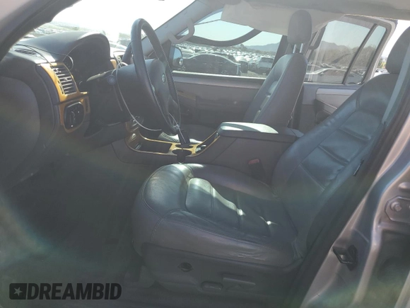 2004 Ford Explorer XLT with VIN 1FMDU63WX4UB53231, listed as a Copart auction lot 56230635 with 163,535 mi miles and Salvage title. Bid and sale history available at DreamBid. Image 7.