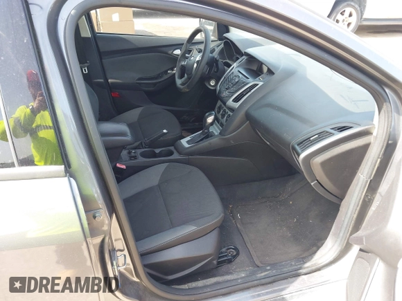 2013 Ford Focus SE with VIN 1FADP3F23DL131327, listed as a IAAI auction lot 42577474 with 146,412 mi miles and . Bid and sale history available at DreamBid. Image 5.