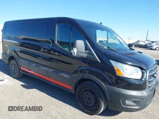 2020 Ford Transit Cargo z VIN 1FTYE1Y82LKA27214, wystawiony jako IAAI lot #42225584 z przebiegiem 83 525 mil mil oraz . Historia ofert i sprzedaży dostępna na DreamBid. Obrazek 1.