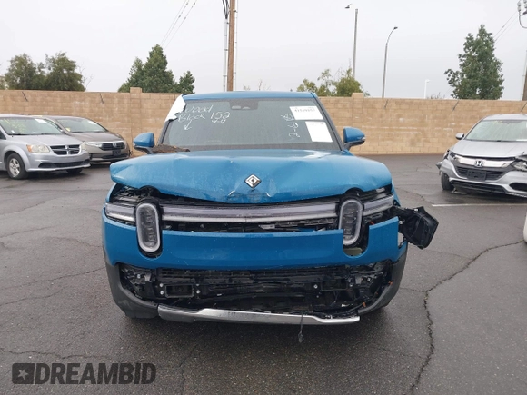 2025 Rivian R1T Adventure z VIN 7FCTGBAA9SN035986, wystawiony jako IAAI lot #41510257 z przebiegiem 2 102 mil mil oraz . Historia ofert i sprzedaży dostępna na DreamBid. Obrazek 13.