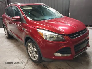 2014 Ford Escape Titanium with VIN 1FMCU9J9XEUD69589, listed as a IAAI auction lot 42031882 with 123,632 mi miles and . Bid and sale history available at DreamBid. Image 1.
