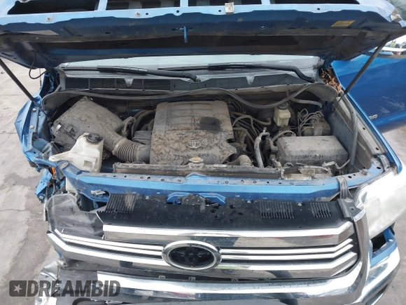 2016 Toyota Tundra SR z VIN 5TFRM5F13GX095535, wystawiony jako IAAI lot #41618316 z przebiegiem 131 386 mil mil oraz . Historia ofert i sprzedaży dostępna na DreamBid. Obrazek 10.