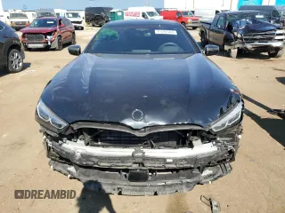 2022 BMW 8 Series M850i z VIN WBAGV8C03NCH58172, wystawiony jako Copart lot #71592504 z przebiegiem 25 854 mil mil oraz Czysty tytuł • Clean title. Historia ofert i sprzedaży dostępna na DreamBid. Obrazek 5.