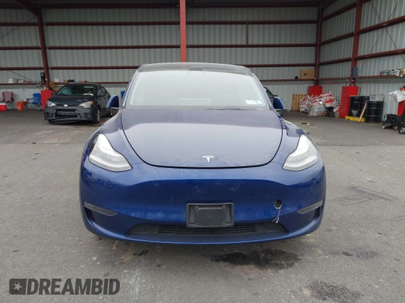 2021 Tesla Model Y Long Range with VIN 5YJYGDEE9MF071120, listed as a IAAI auction lot 40870088 with 73,438 mi miles and . Bid and sale history available at carsss.com. Image 13.