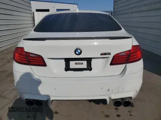 2014 BMW M5 with VIN WBSFV9C54ED097462, listed as a Copart auction lot 70482504 with 76,501 mi miles and Clean Title. Bid and sale history available at carsss.com. Image 6.